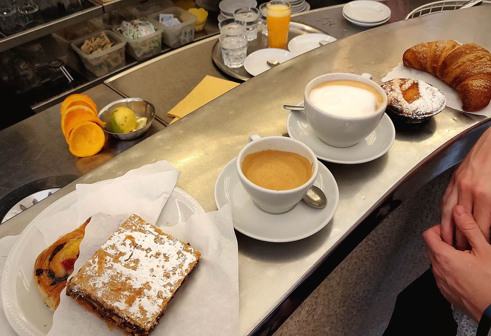 Same cafe counter photo after commercial color and clarity repair